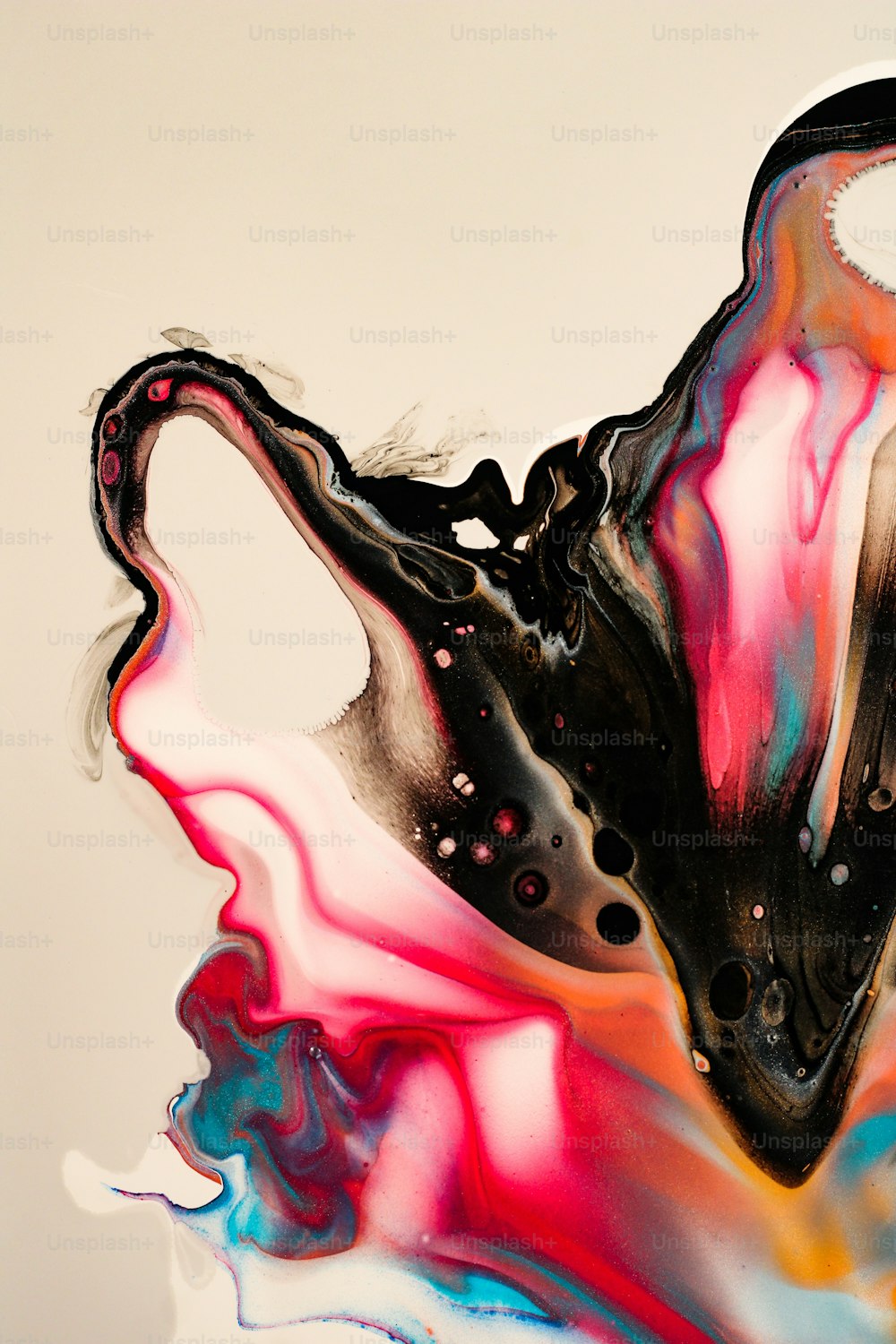 a black and pink abstract painting on a white background