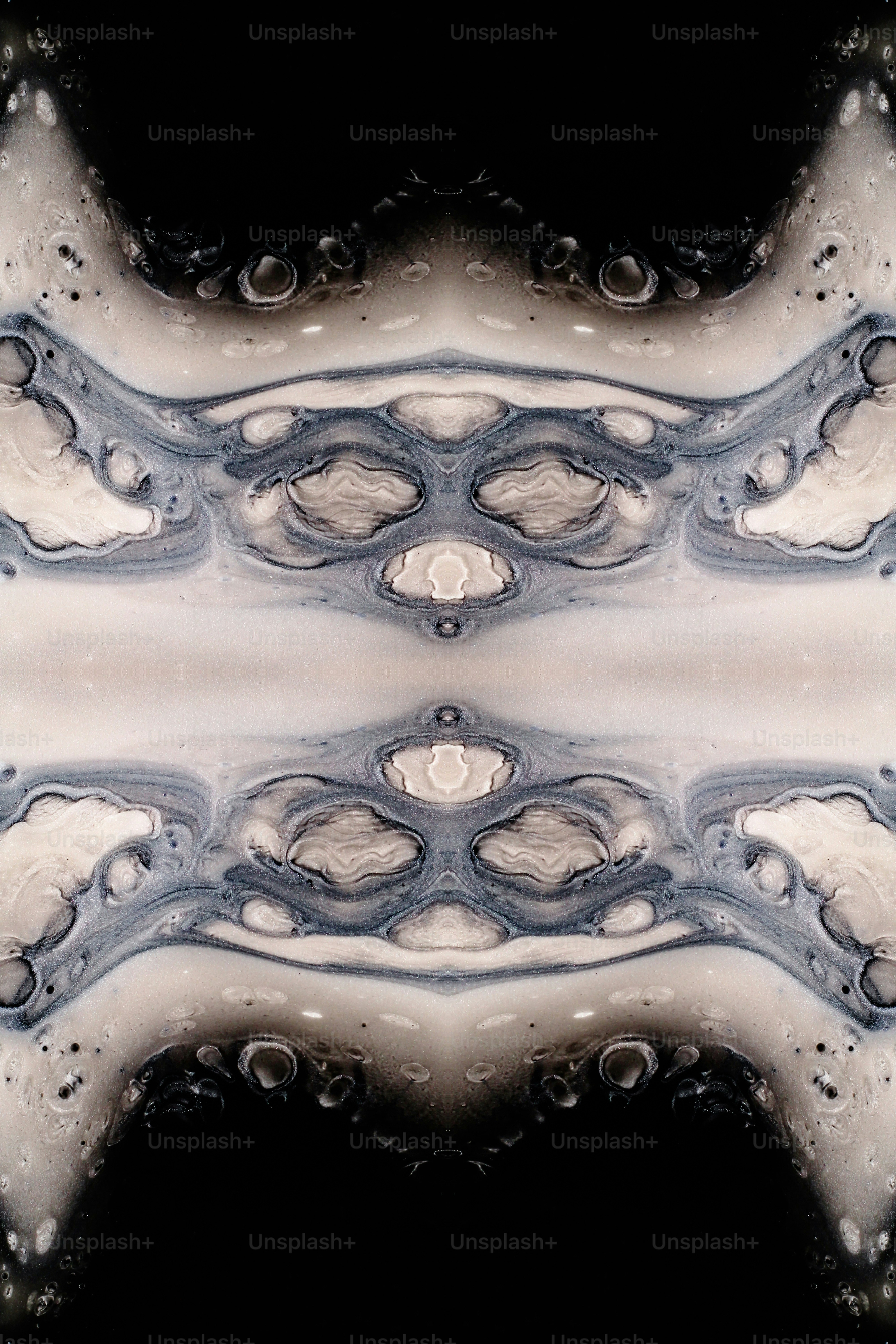 a black and white photo with a black background