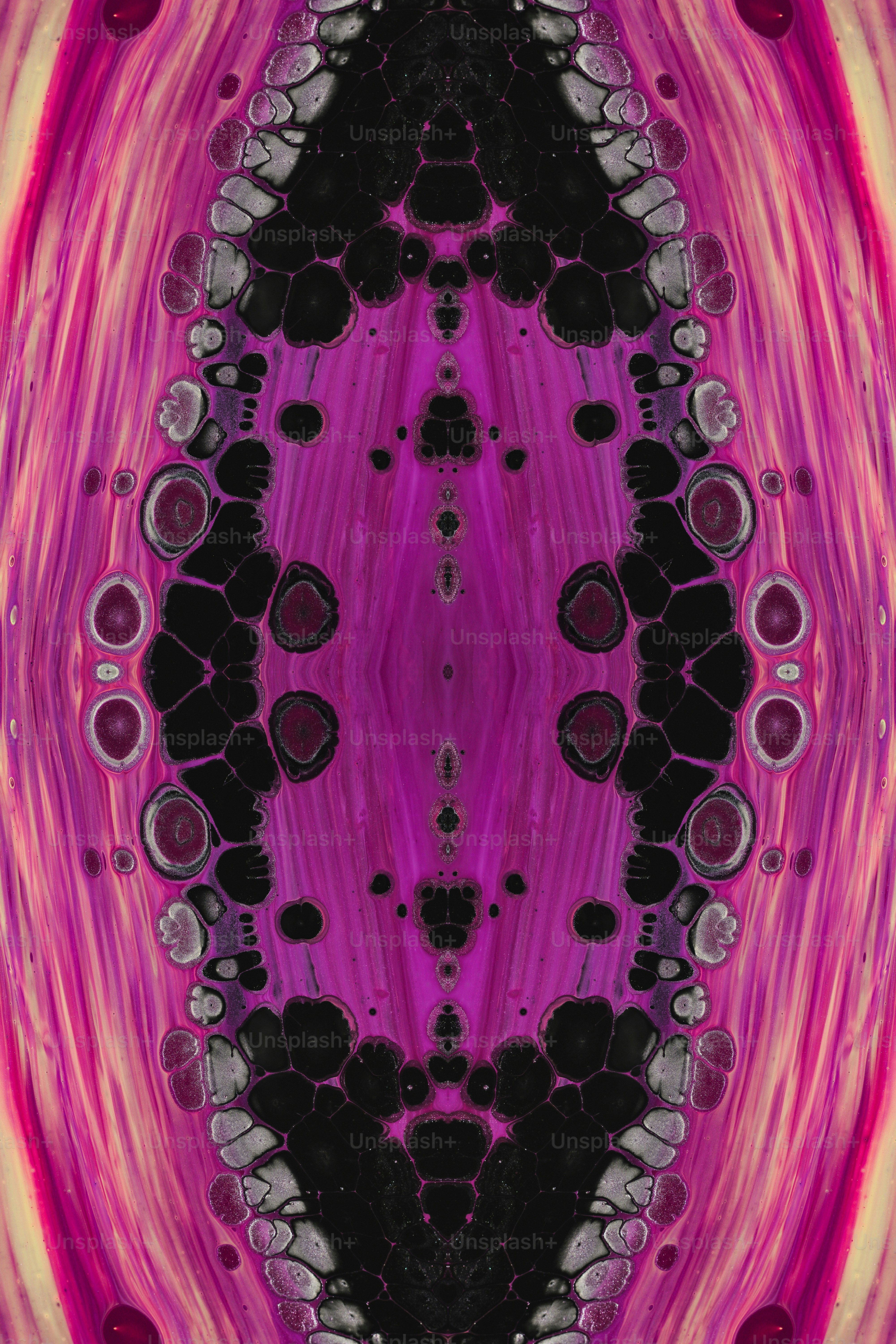 a pink and black abstract background with a circular design