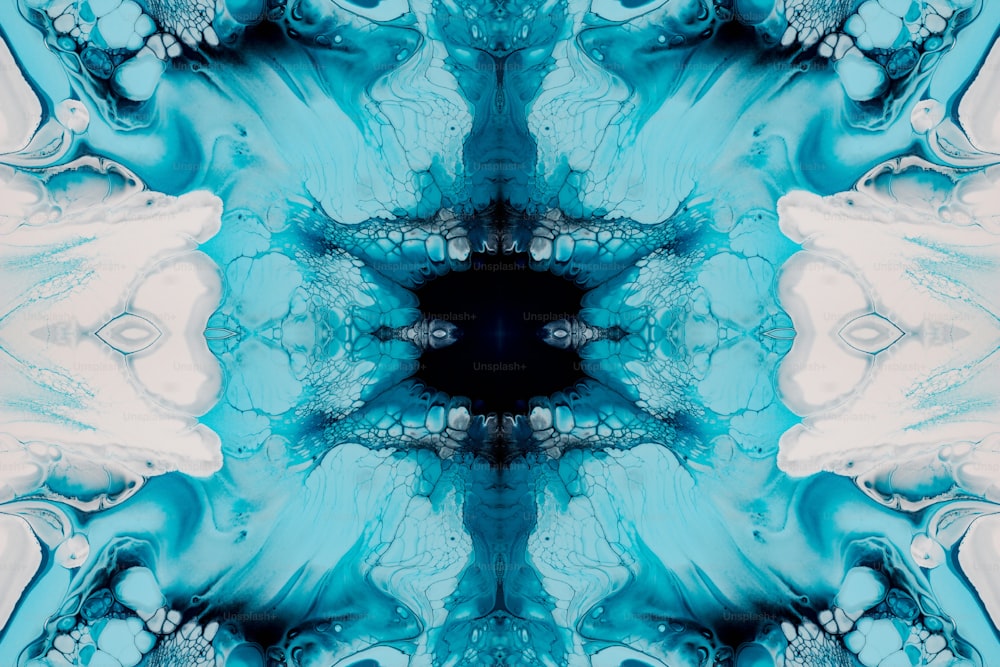 Un diseño abstracto azul y blanco con un centro negro