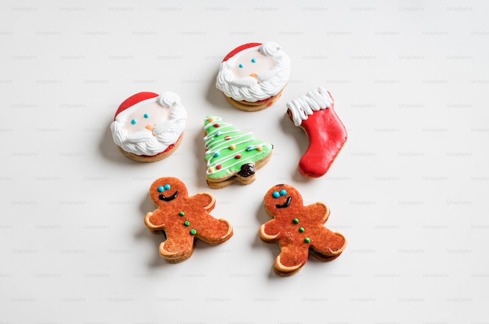 a group of decorated cookies sitting on top of a table