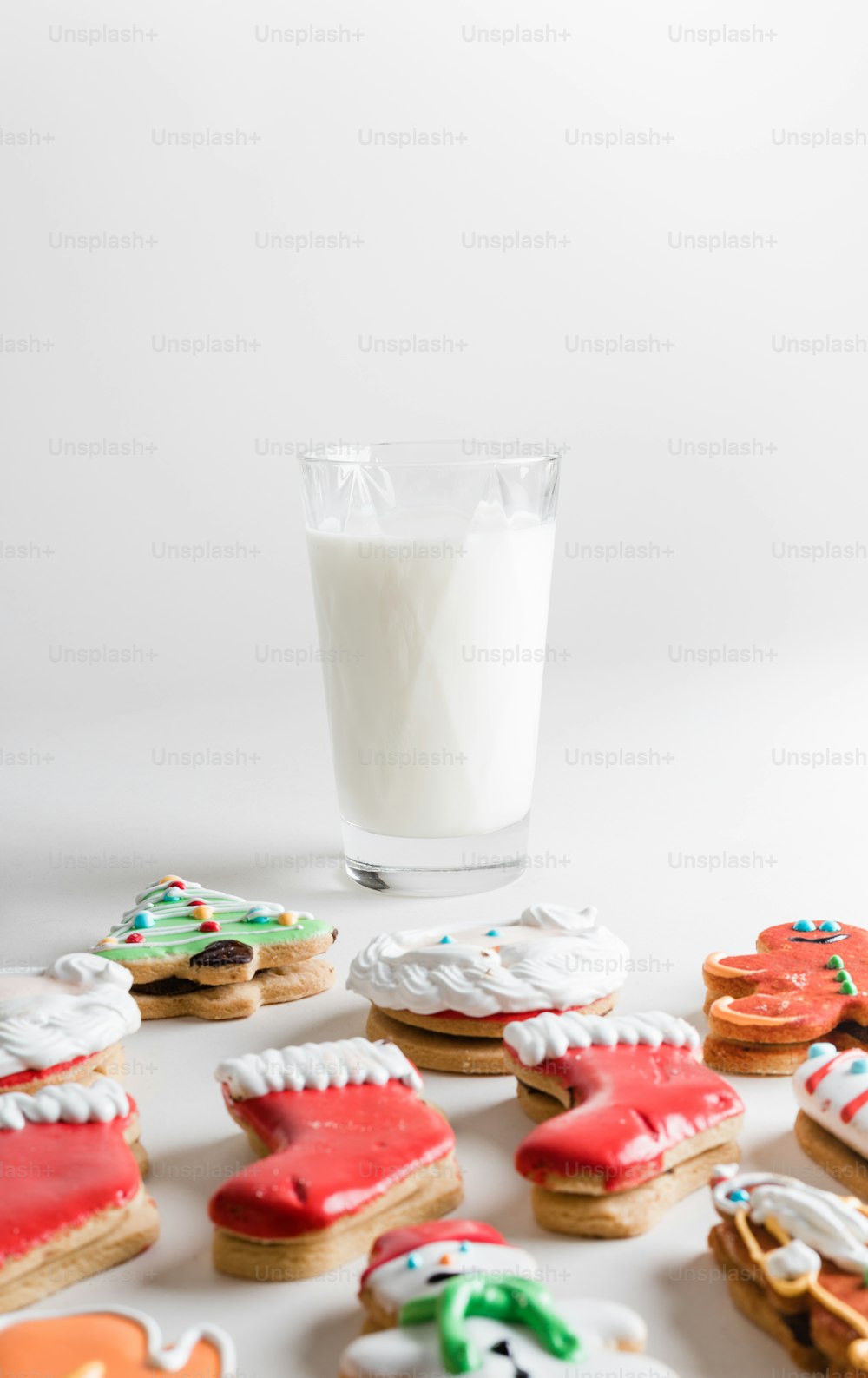 a glass of milk and some cookies on a table