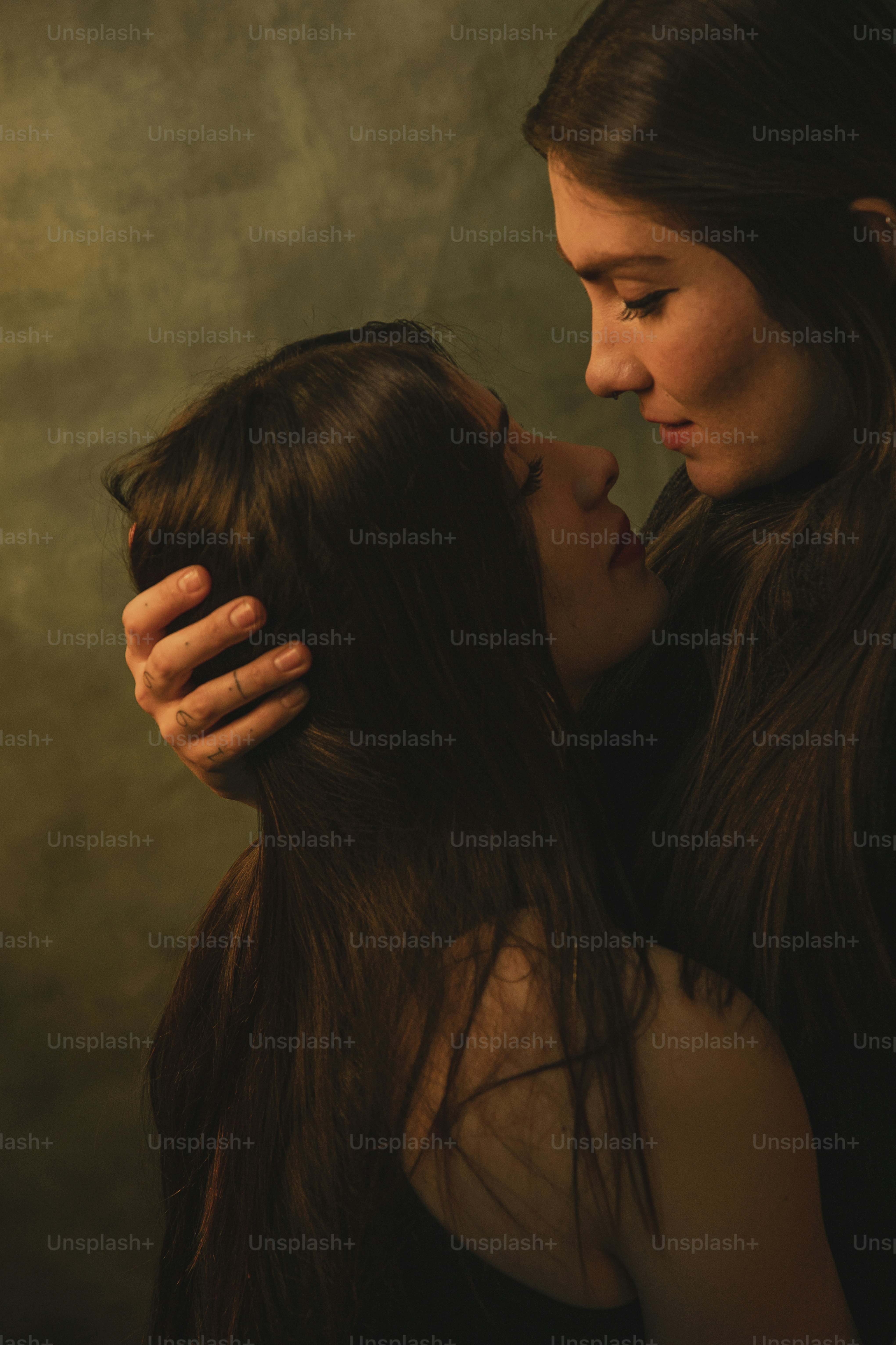 a couple of women standing next to each other