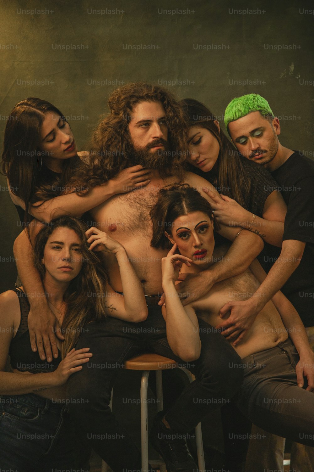 a group of naked people posing for a picture