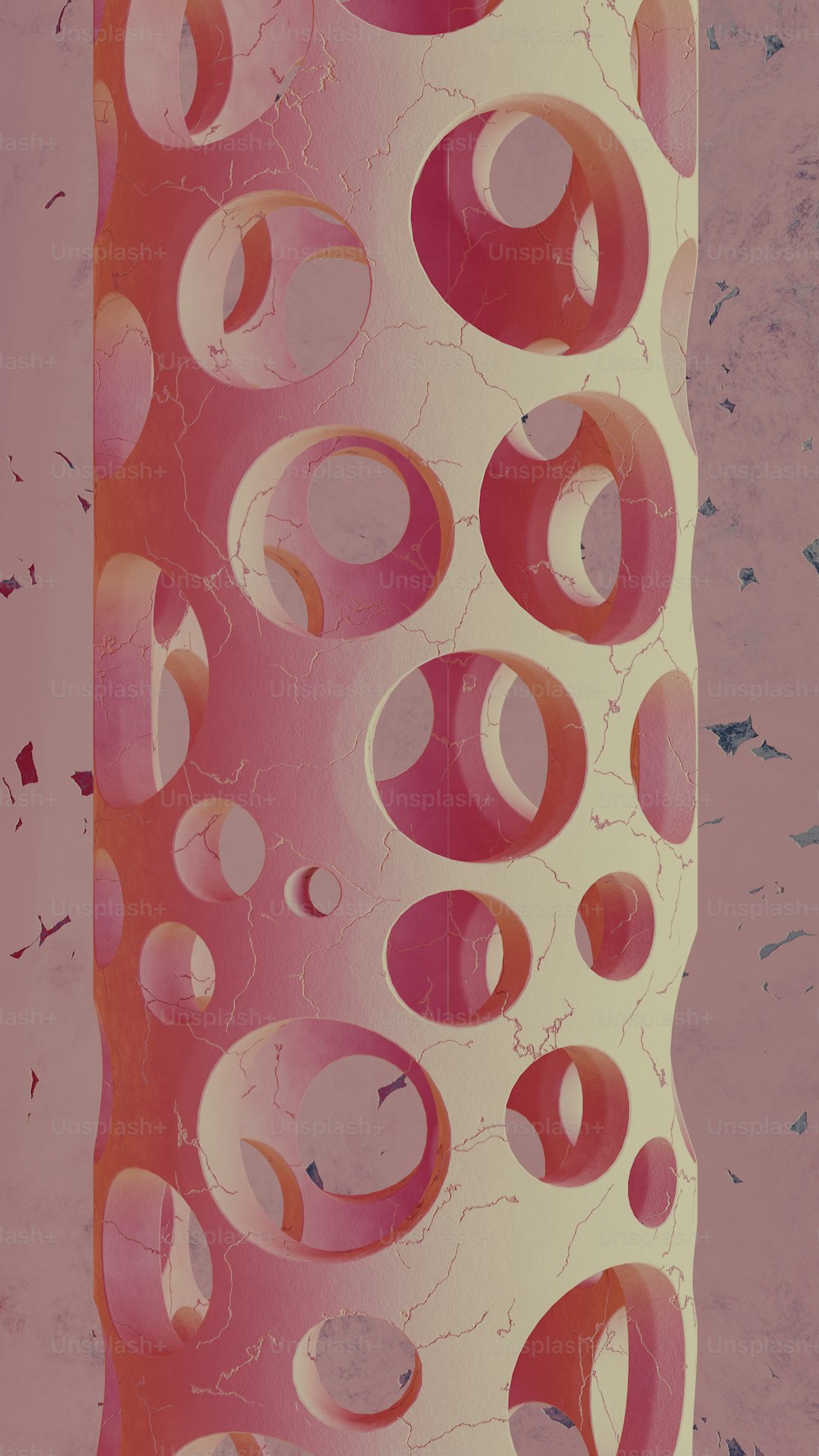 a pink and white vase with circles on it