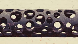 a close up of a metal object with holes in it