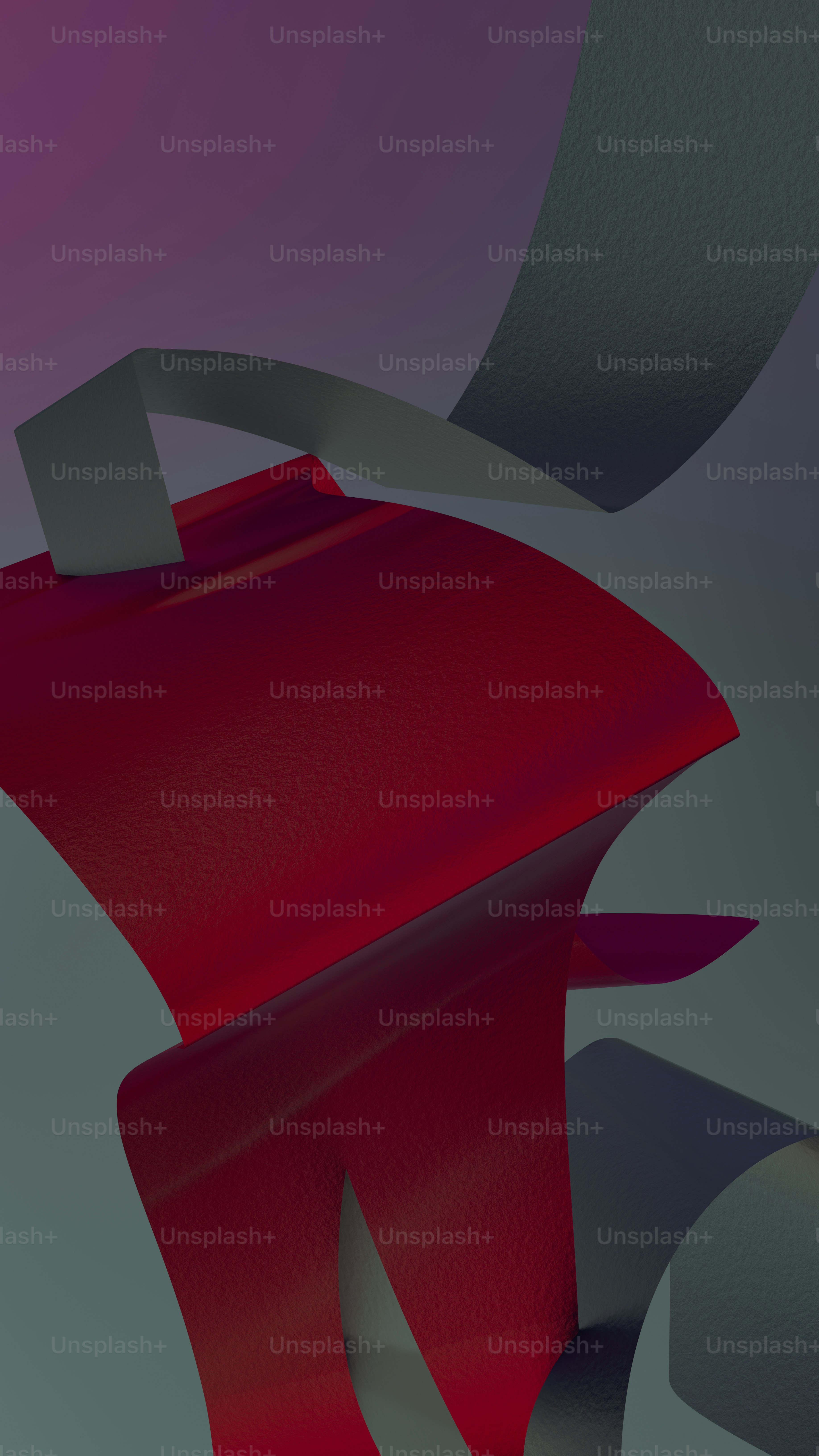 a red chair sitting on top of a gray floor