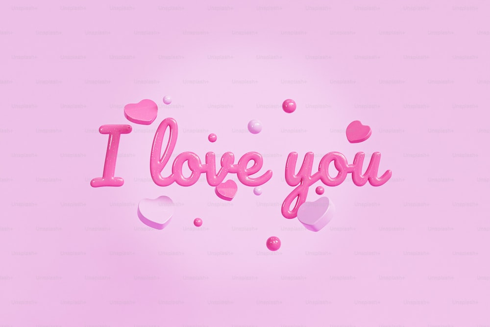 the word i love you is cut out of pink paper
