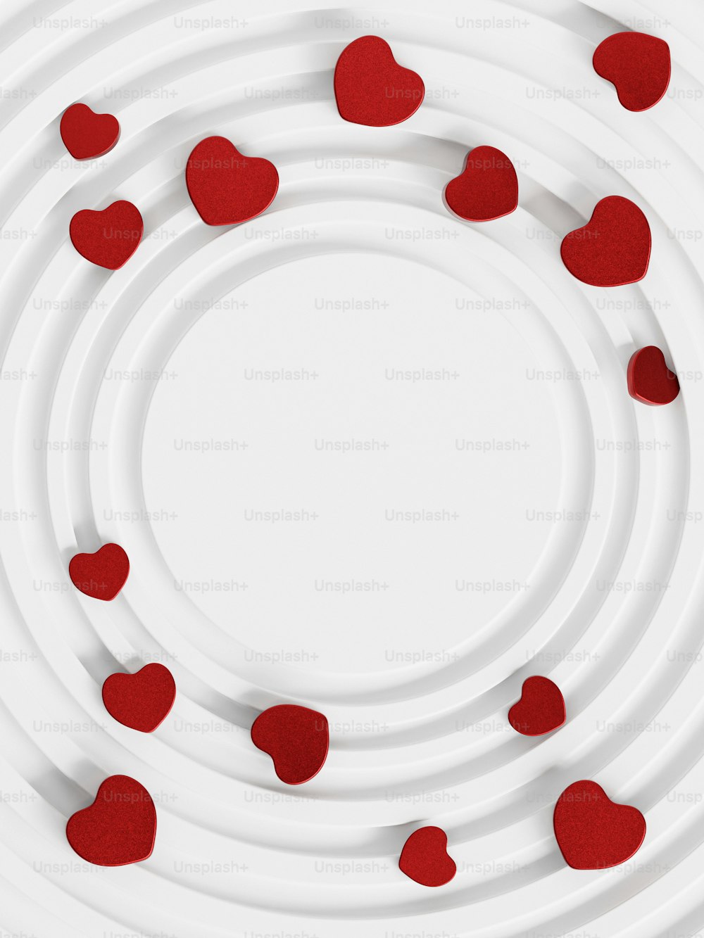a circle of red hearts on a white background