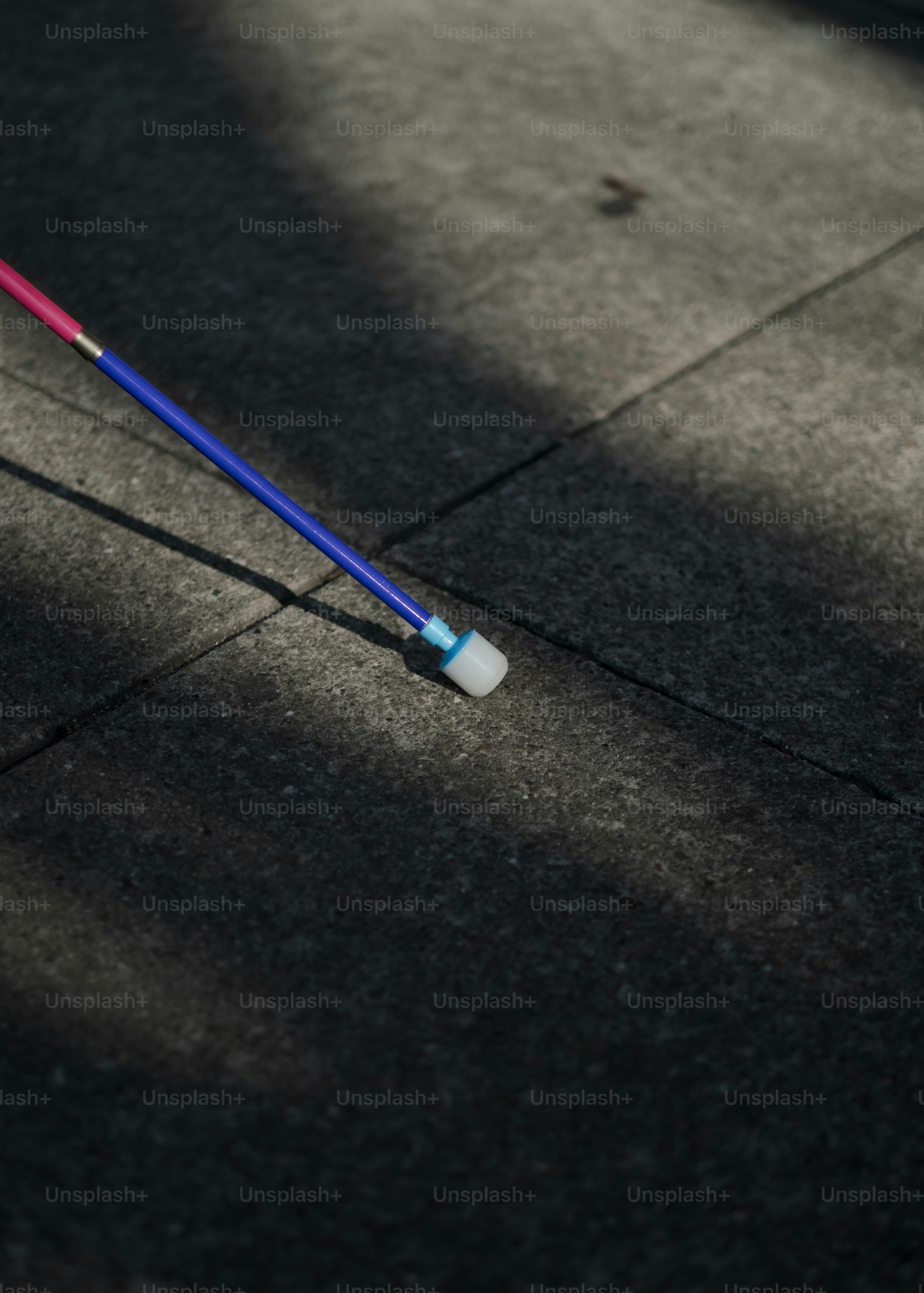 Tiffany, a visually impaired woman, expresses the use of her guide cane (also known as a white cane) while taking public transit and walking around the Bay Area.