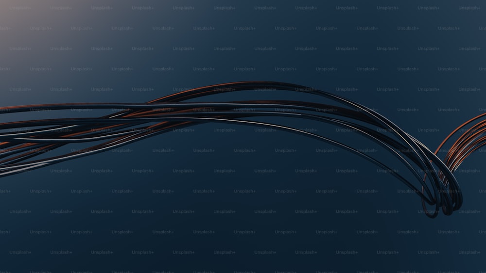 Un primer plano de un montón de cables sobre un fondo azul