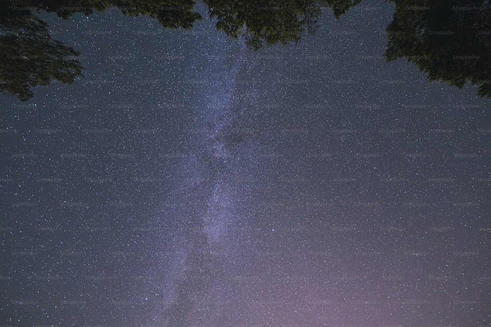 a view of the night sky with the milky in the background