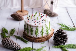 a decorated cake sitting on top of a wooden table