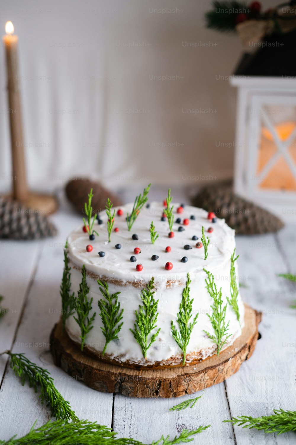 a decorated cake sitting on top of a wooden board