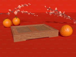 three oranges sitting on top of a wooden box