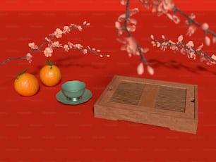 uno sfondo rosso con un vassoio da tè, arance e una tazza da tè