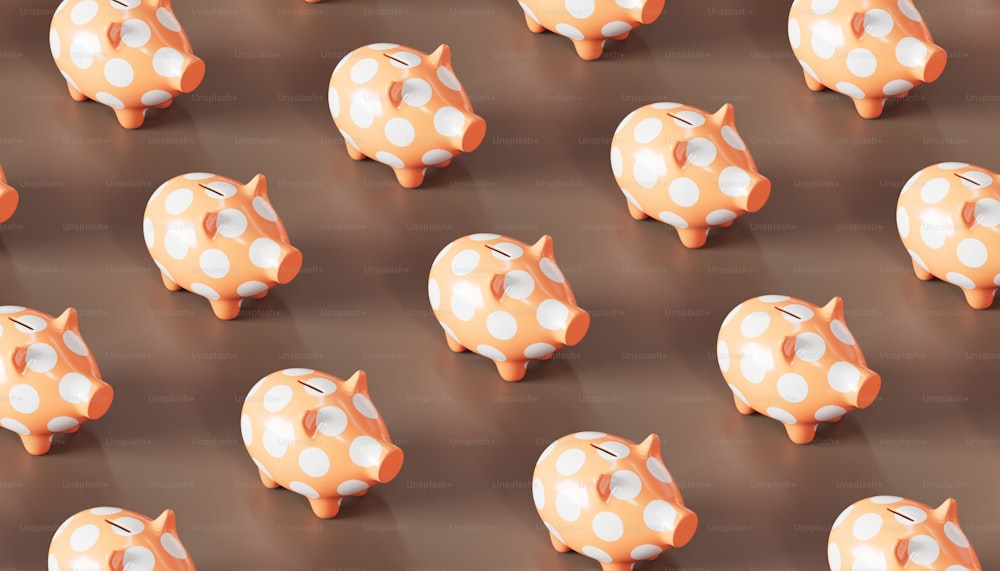 a group of orange and white polka dot piggy banks