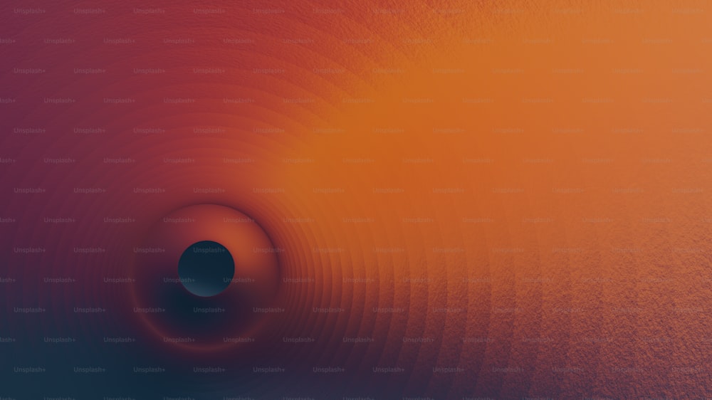 Un agujero negro en el centro de un fondo rojo y naranja