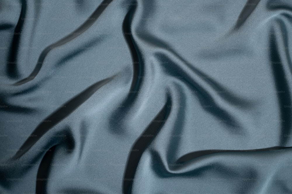 uma vista de perto de um tecido azul