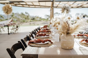 a table set with place settings and place settings