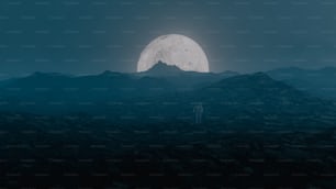 a man standing on top of a mountain under a full moon