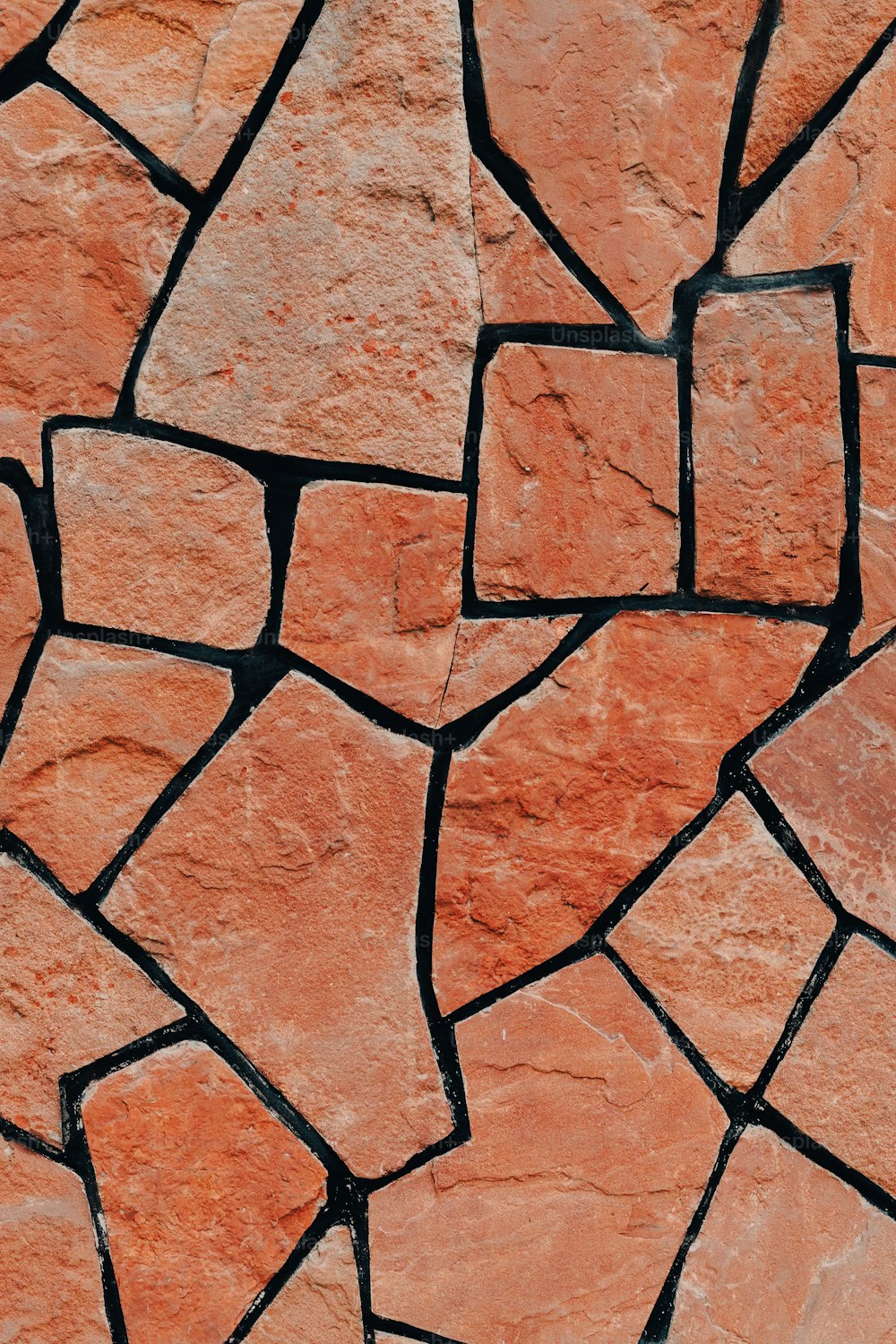 a close up of a red brick wall