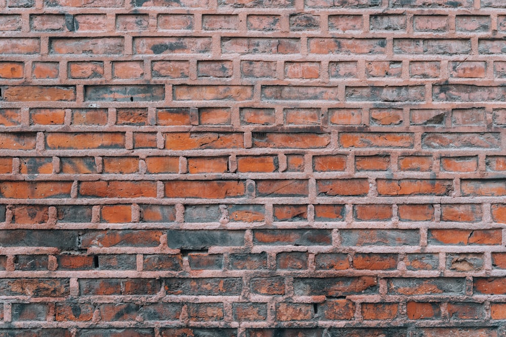 a close up of a brick wall made of bricks