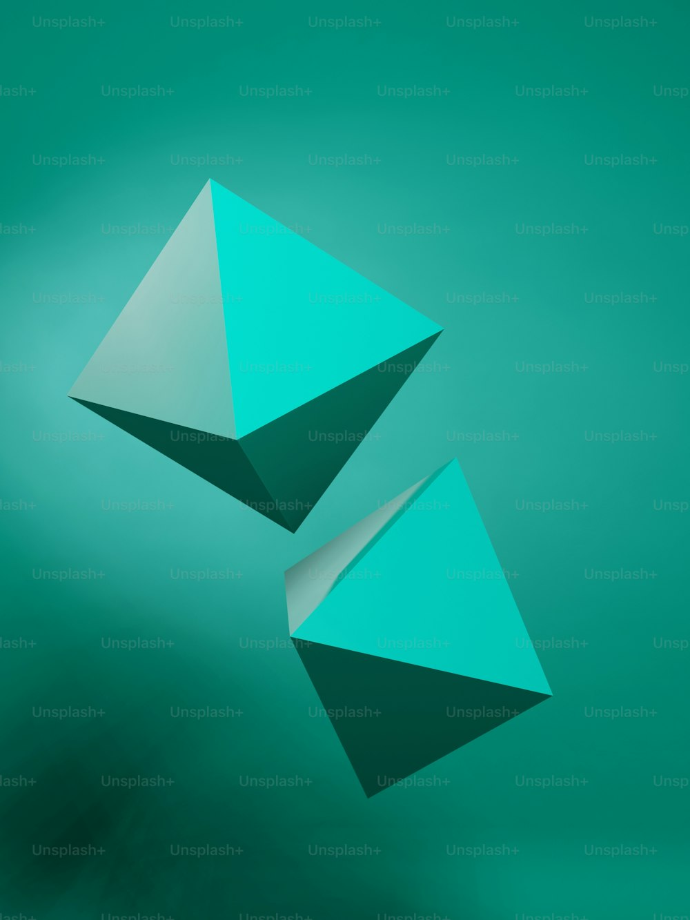 a green background with two shapes in the middle