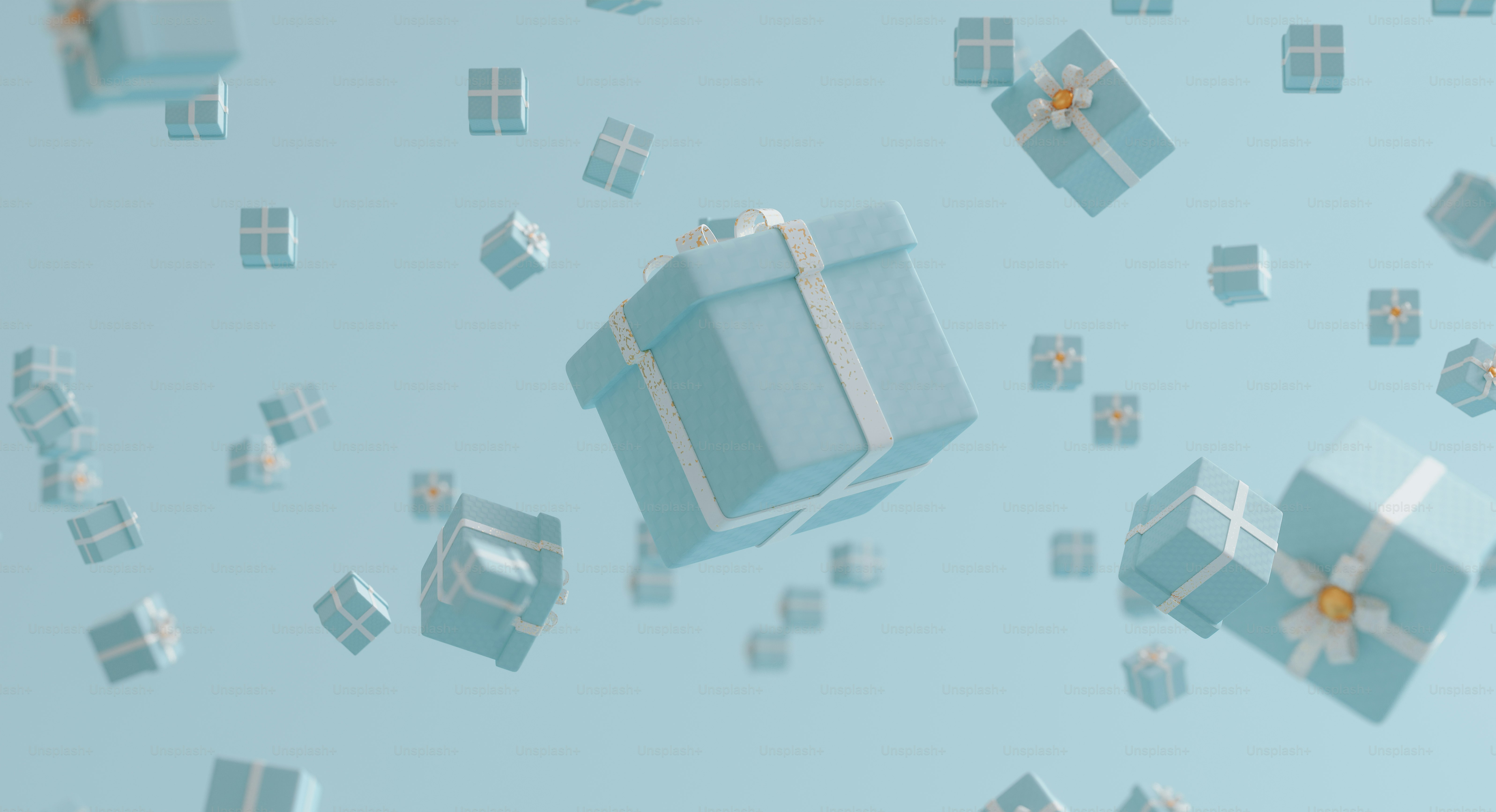 Ein blauer Kasten mit Schleife ist von kleinen Kästchen umgeben