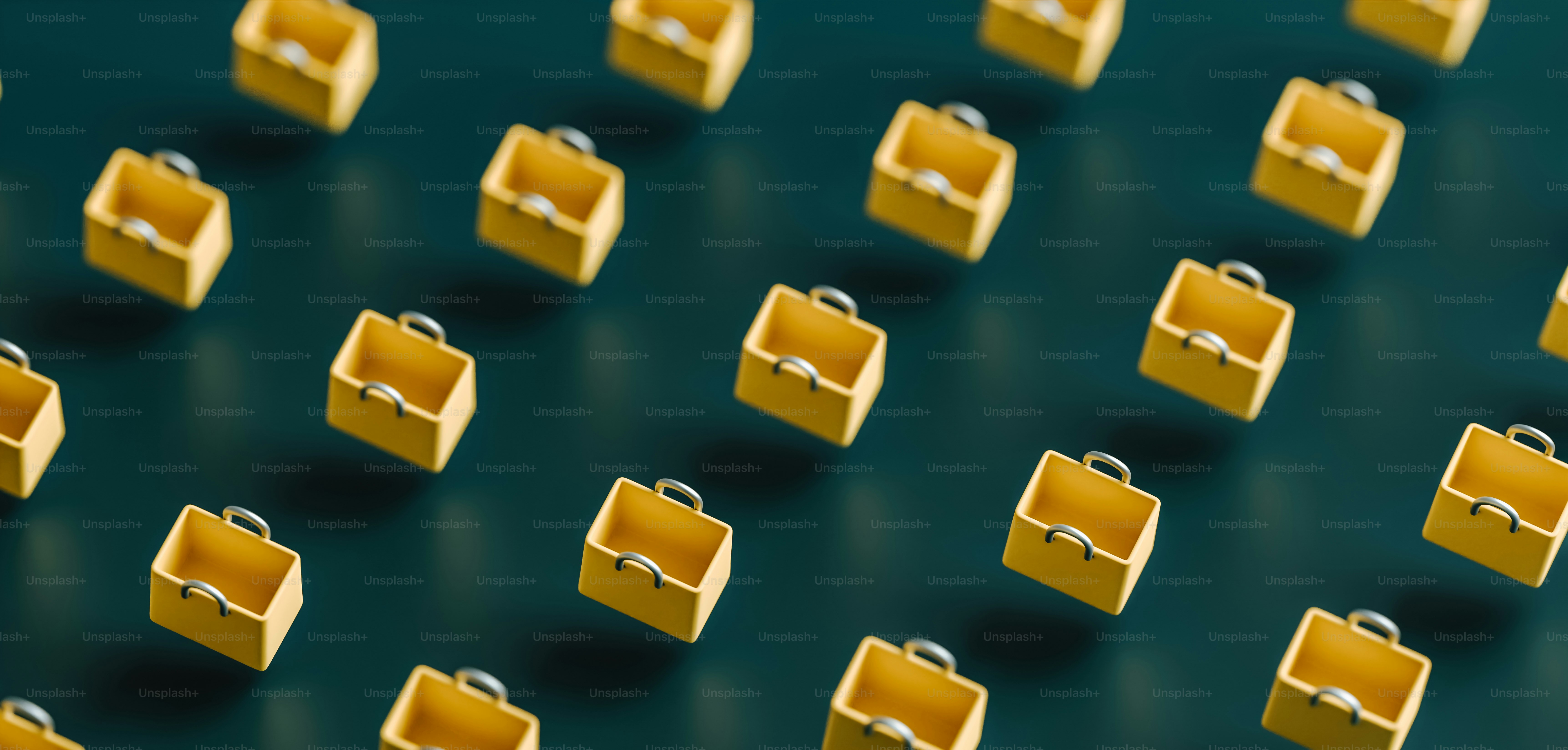a bunch of small yellow boxes with handles
