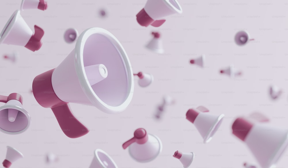 a pink and white megaphone surrounded by other pink and white objects