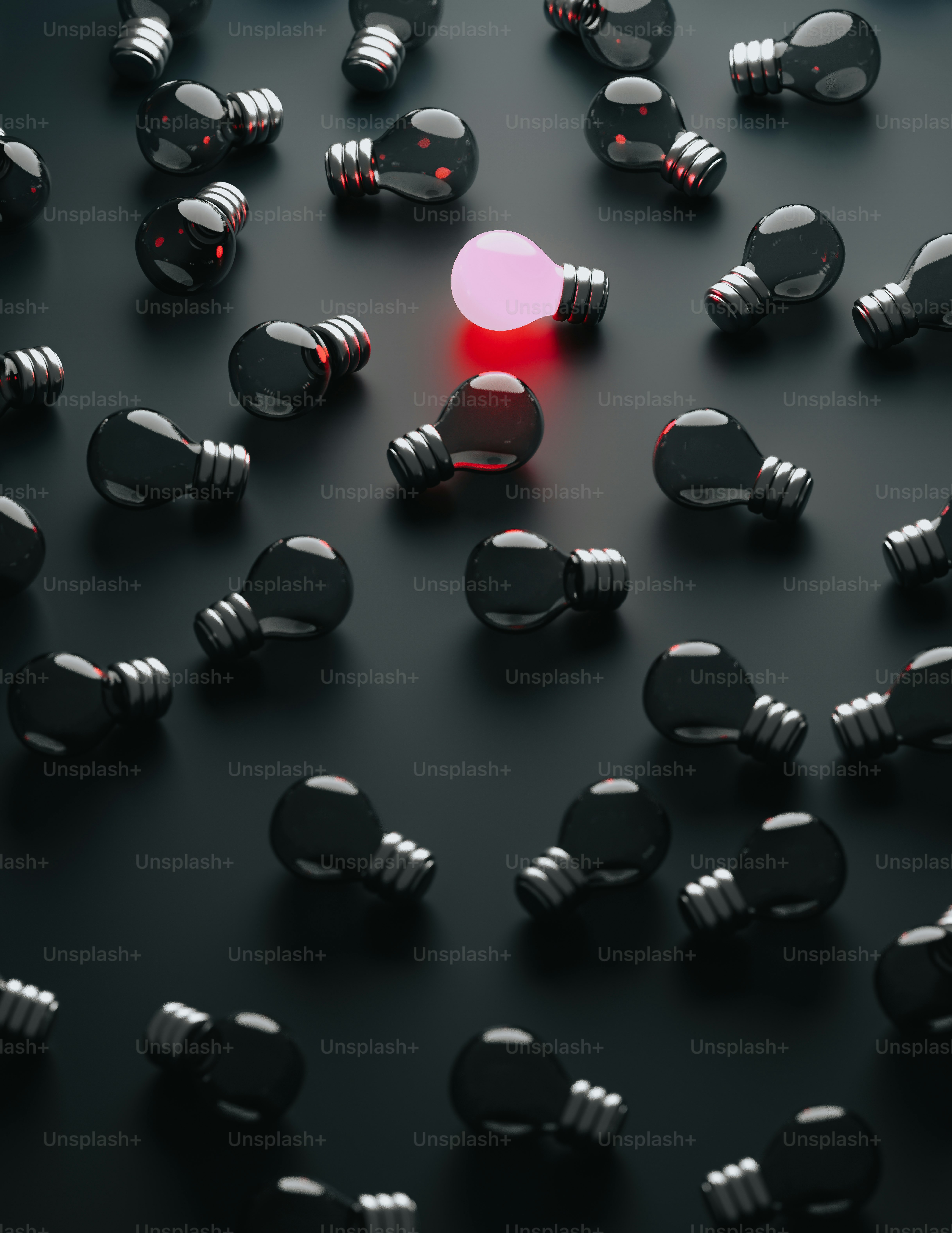 a red light is shining on a black surface