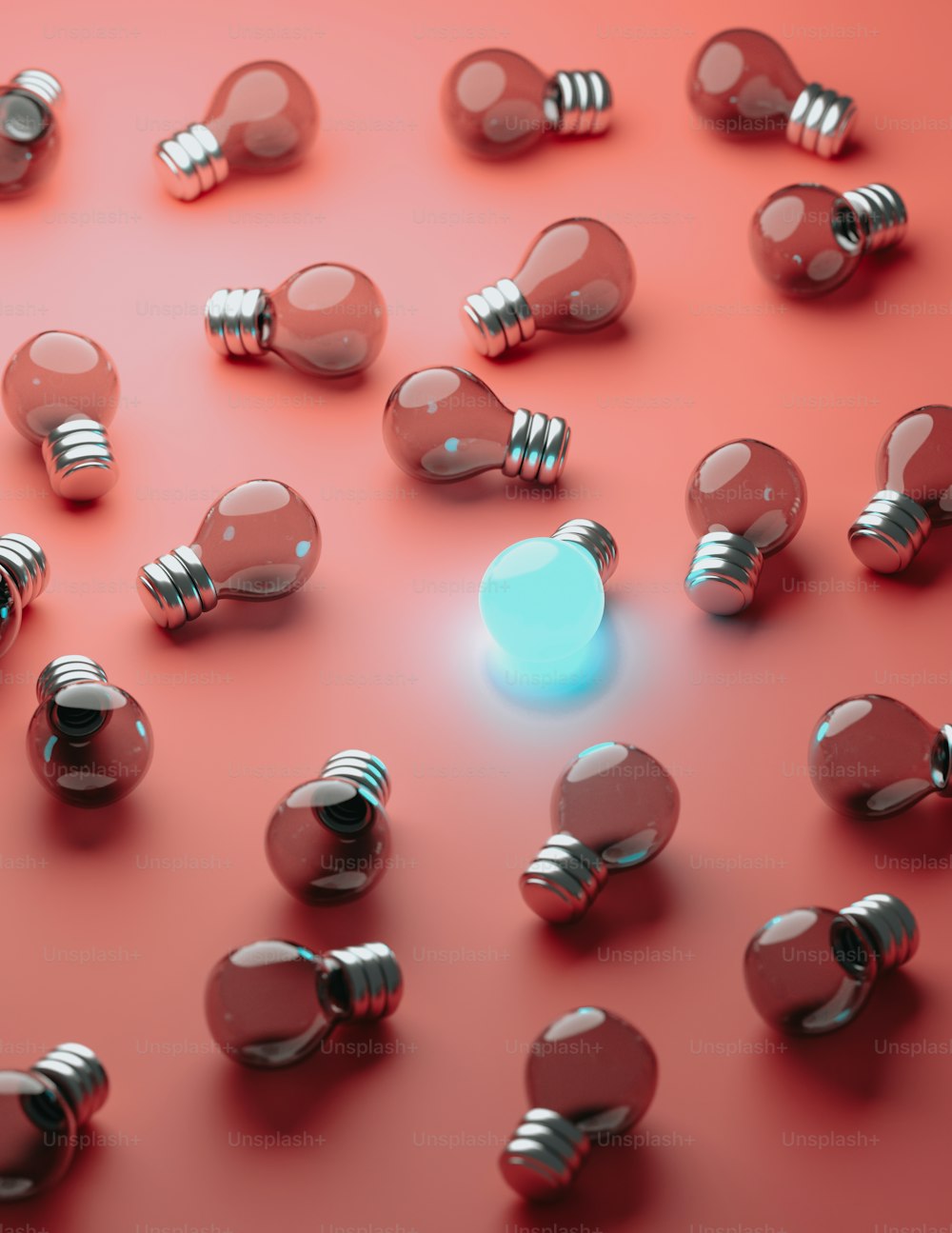 a bunch of light bulbs on a red surface