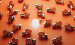 a group of light bulbs sitting on top of an orange surface