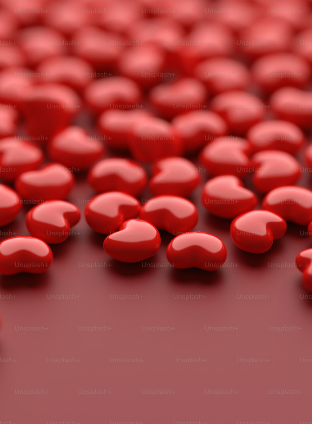a group of red hearts sitting on top of a table