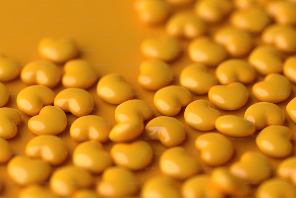 a close up of a bunch of yellow candies