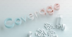 a group of pills sitting next to a word