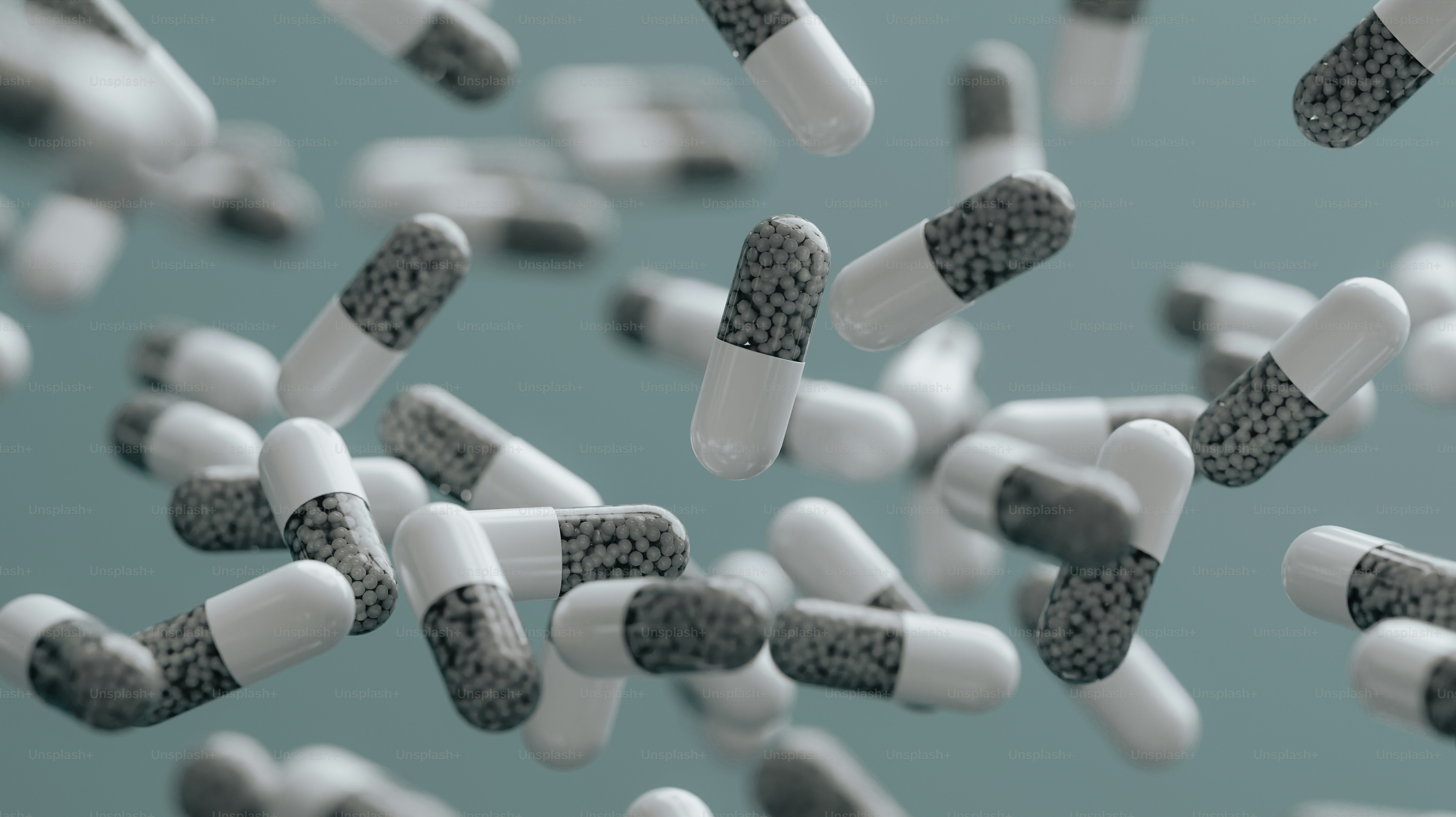 a bunch of pills are flying in the air