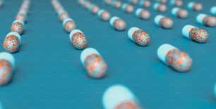 many white and orange pills lined up on a blue surface