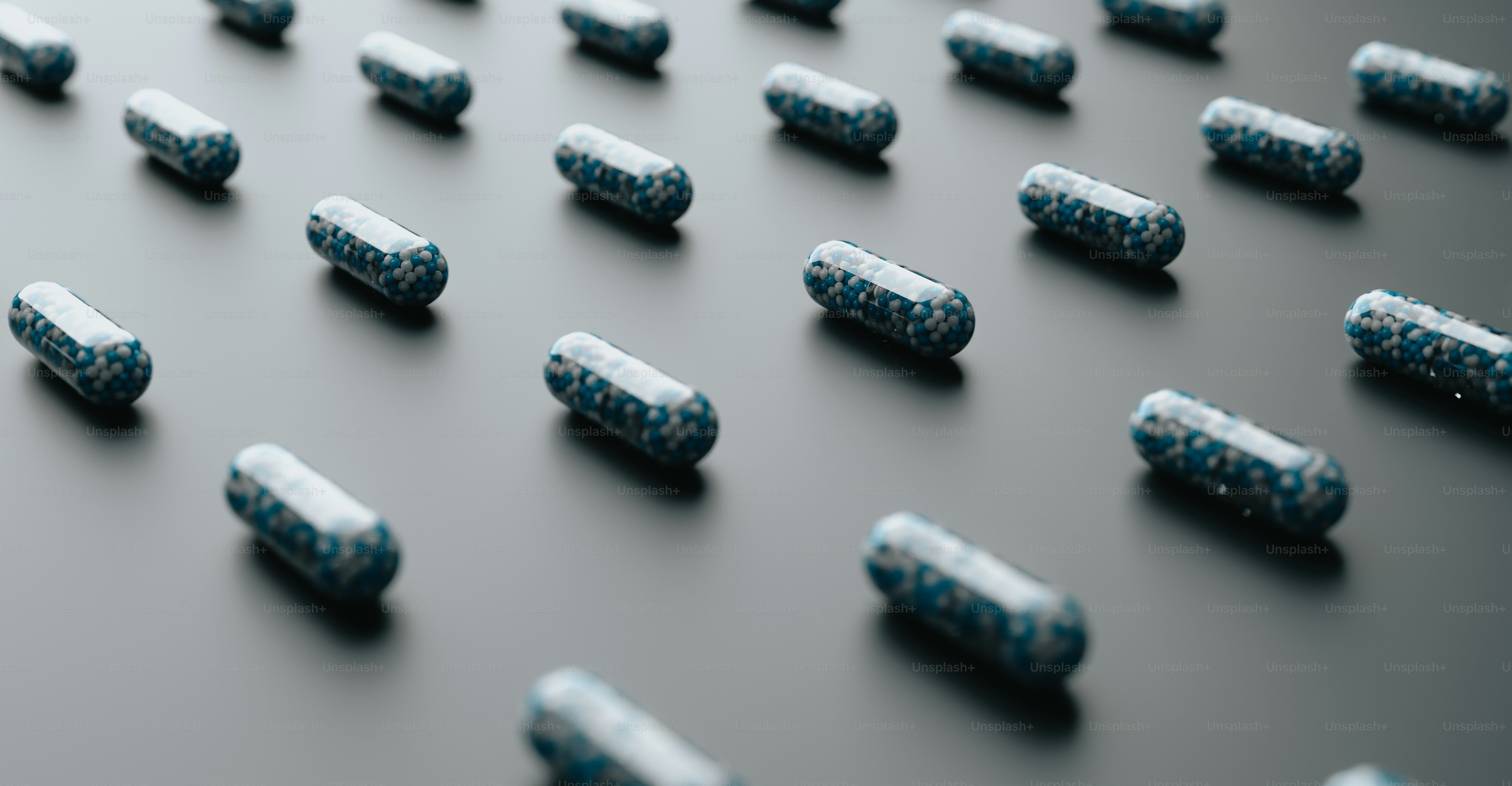 a group of pills sitting on top of a table