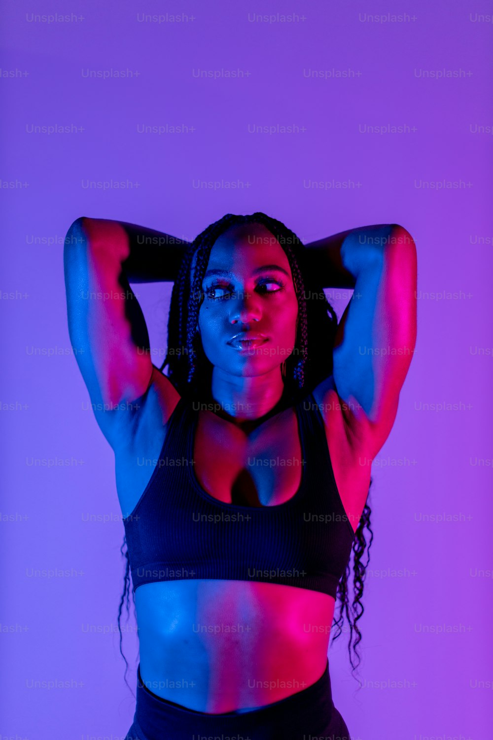 a woman in a sports bra posing for a picture