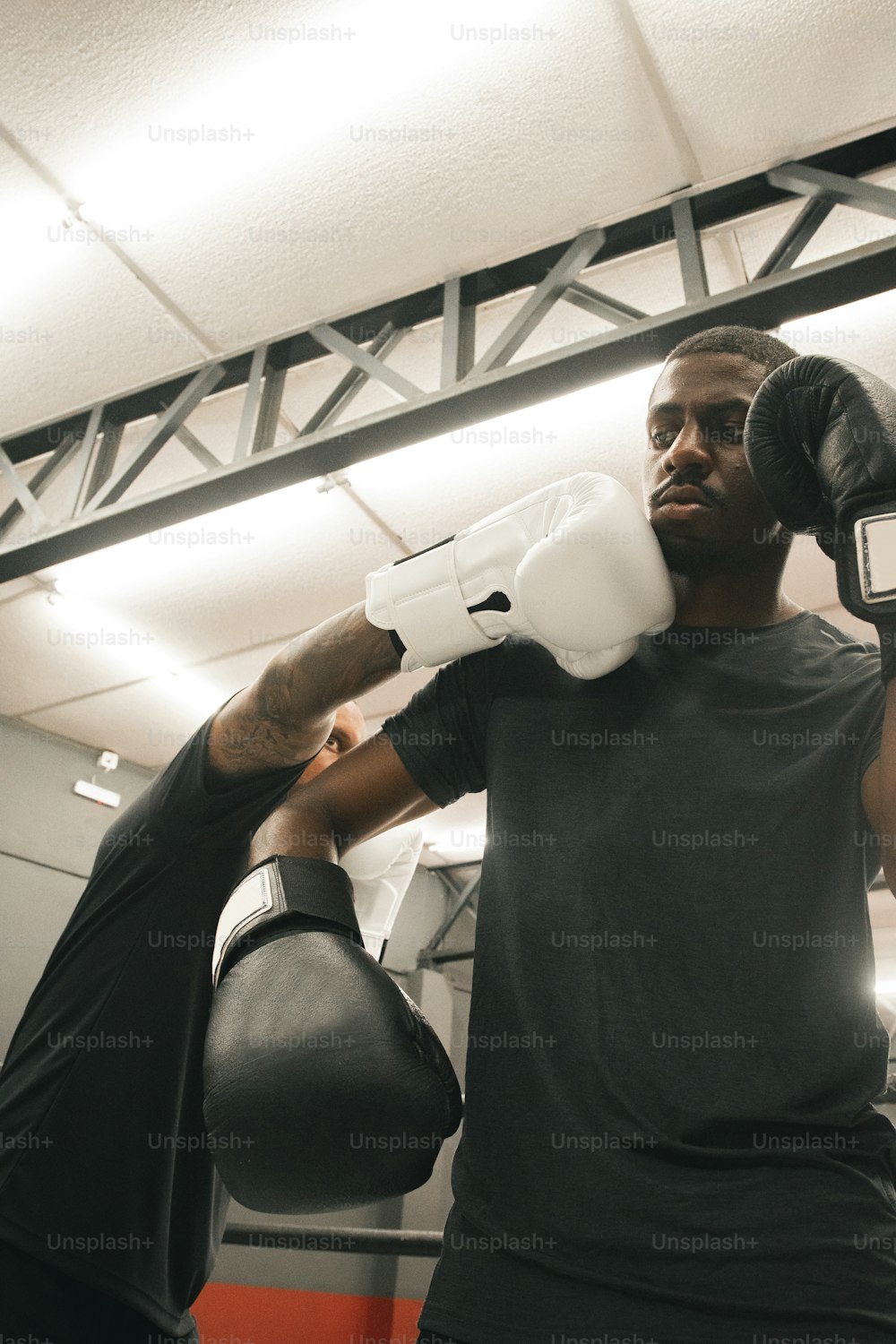 a man wearing boxing gloves and boxing gloves