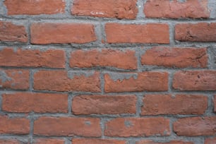 a close up of a red brick wall