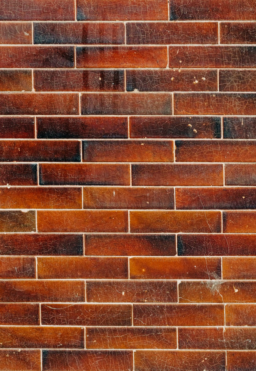 a close up of a red brick wall