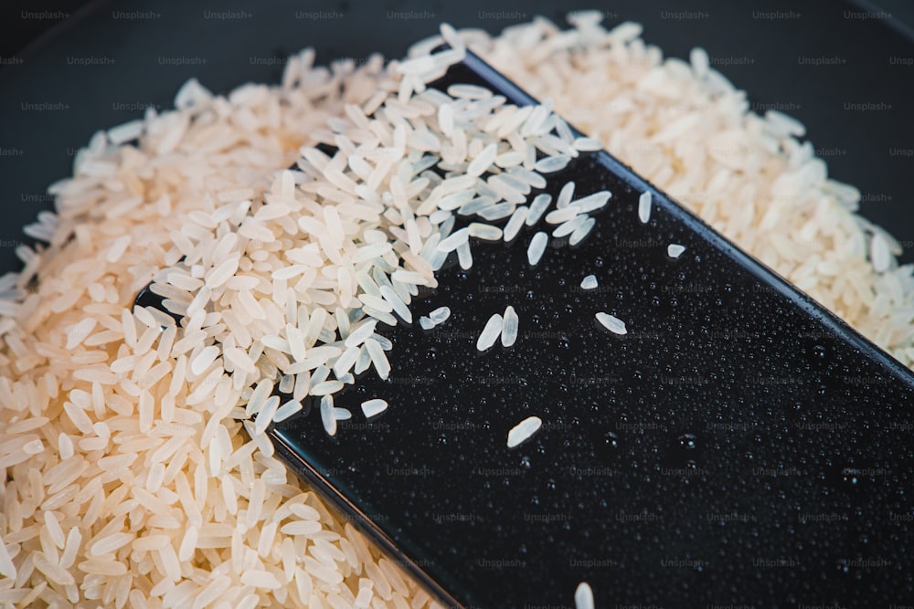 a close up of rice and a spatula on a plate