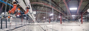 a man on a skateboard in a large building