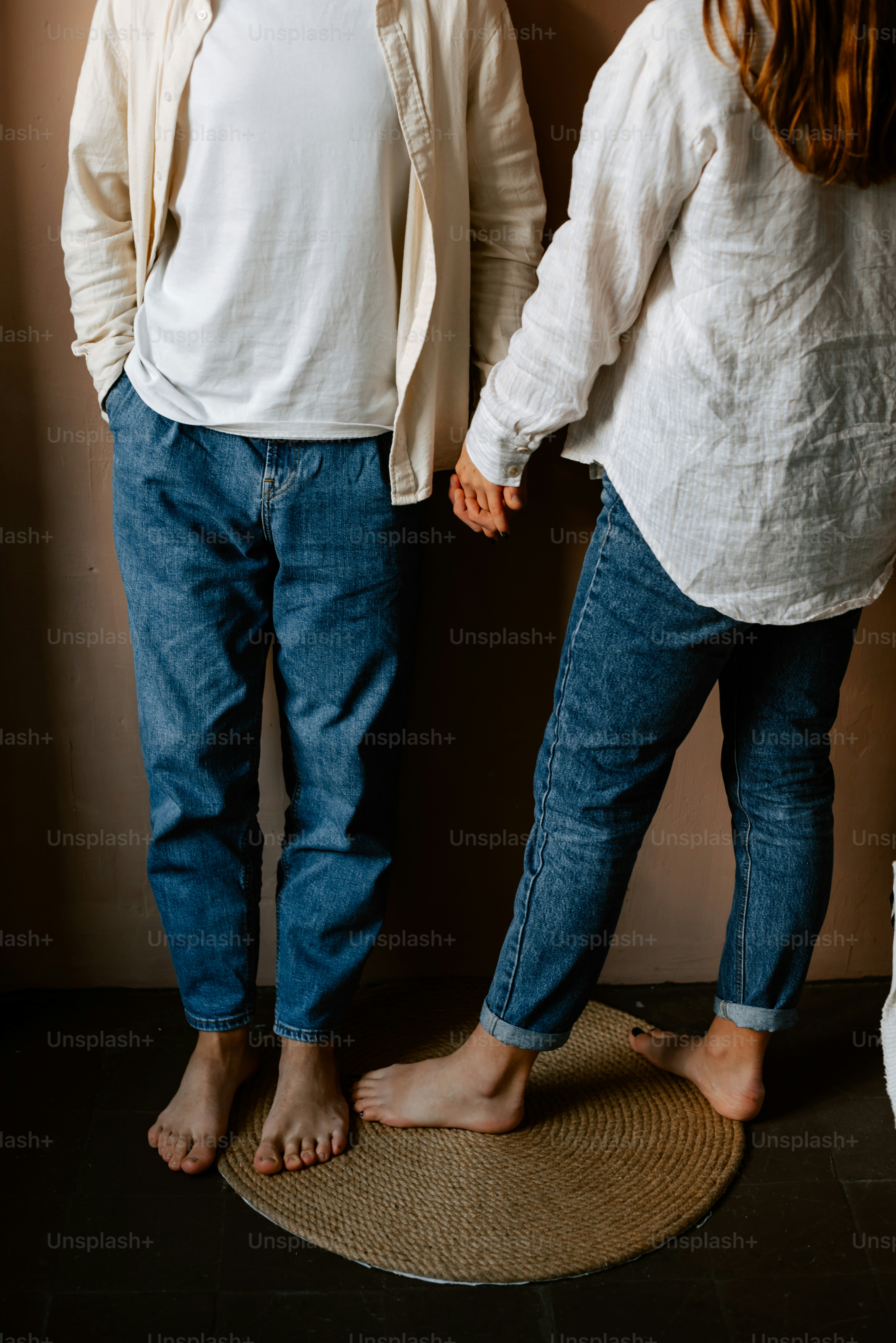 a couple of people standing next to each other