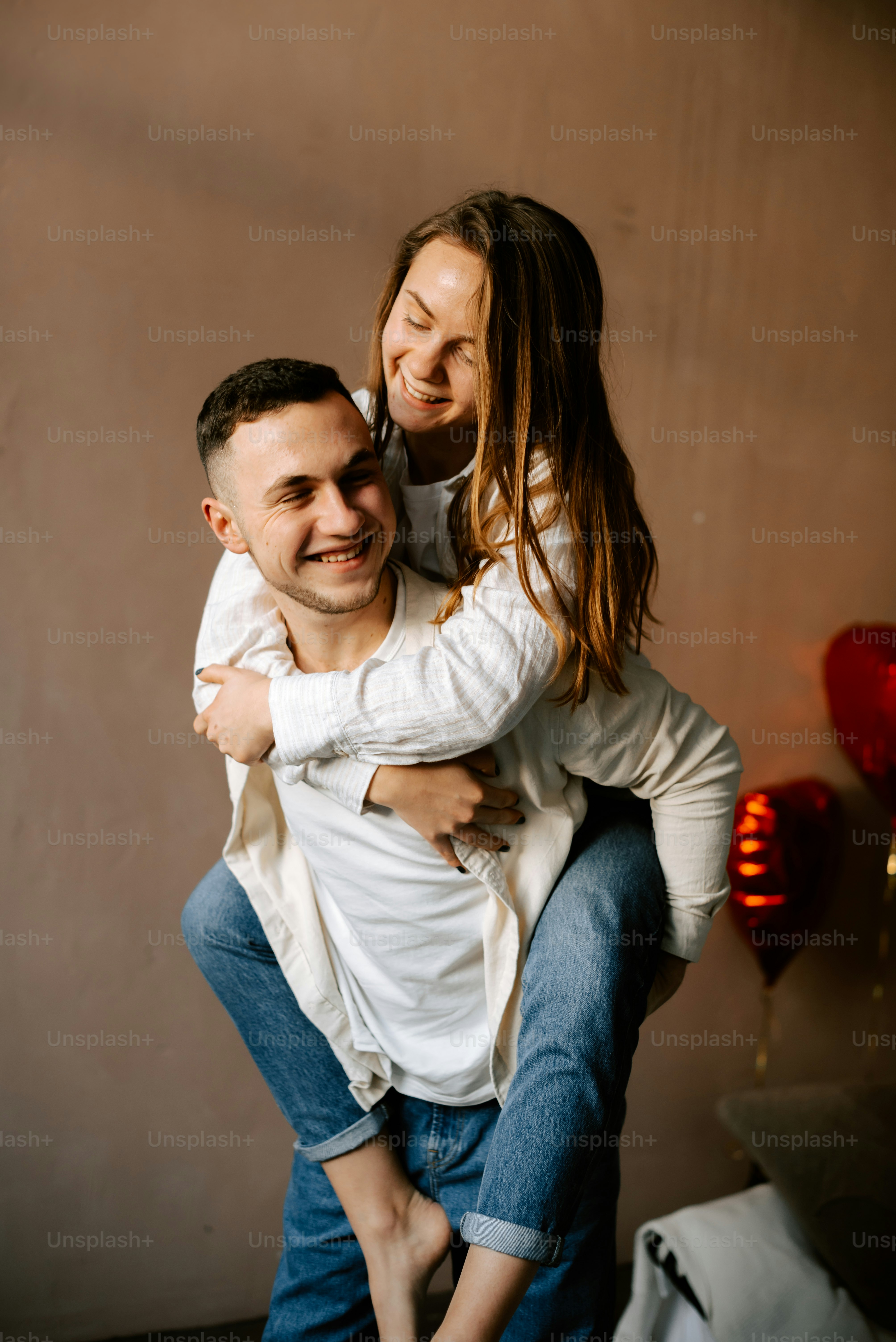 a man holding a woman in his arms