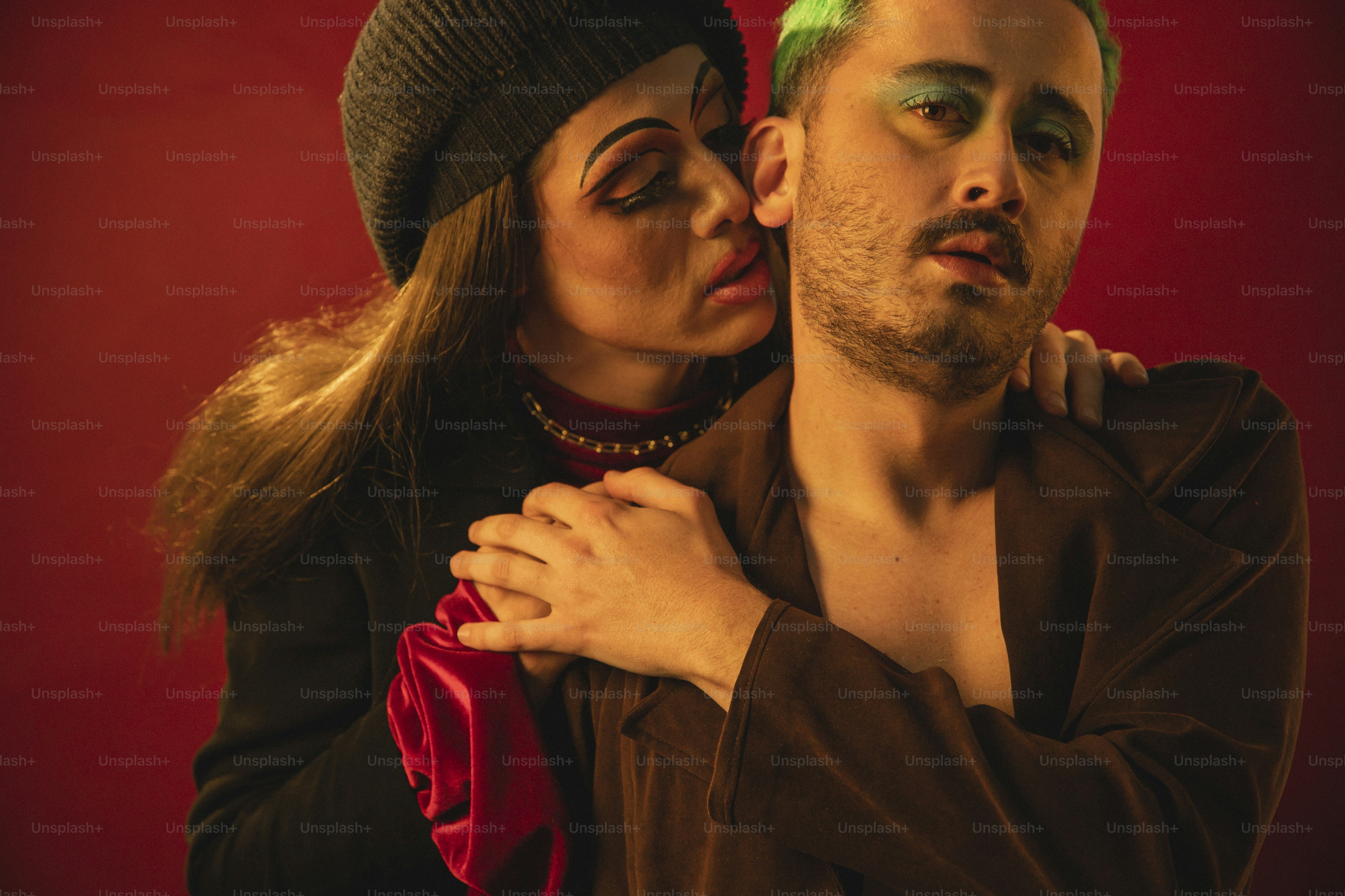 a man and a woman posing for a picture