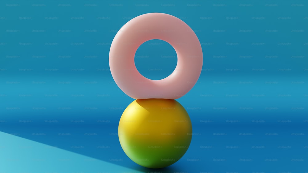 uma imagem 3d de uma bola com um anel em cima dela